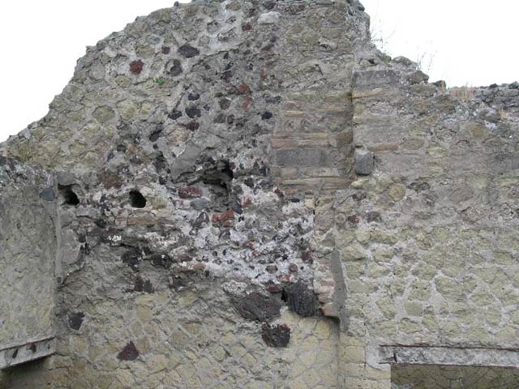 IV.18, Herculaneum, May 2005. Room 11, atrium, upper west wall, with doorway from room 4, on left, and room 5, on right.
Photo courtesy of Nicolas Monteix.